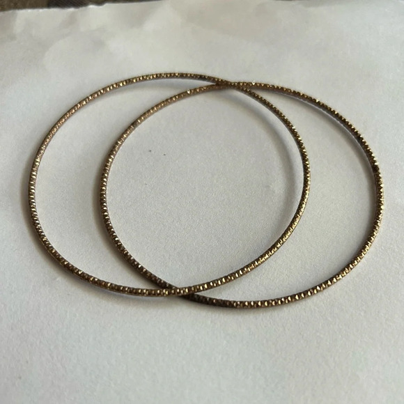 3/$20 2 Piece Set Gold Tone Imprinted Shimmer Thin Large Bangle Bracelets - Picture 1 of 4